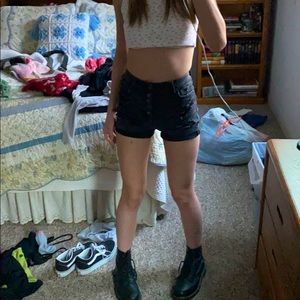 Black ripped shorts